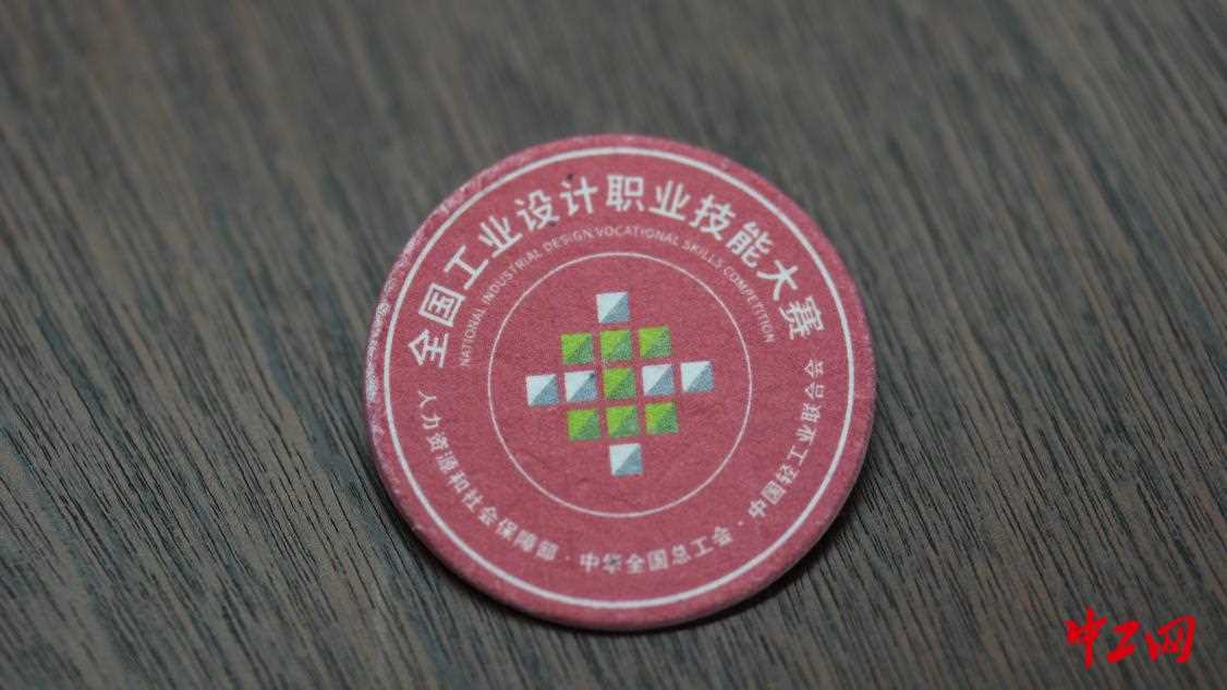 20260227081735-69a1531f5f9f0.jpg 从会“生长”的徽章到可“循环”木屑 这届大赛绿意满满